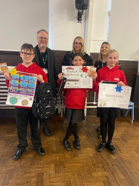 Pictured are members of the Trelleborg team along with the winners of a recent competition they ran, which promoted the idea of travelling more sustainably to and from school.